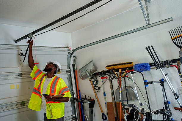 Professional Garage Door Panel Replacement technician working in Cherokee County County, OK
